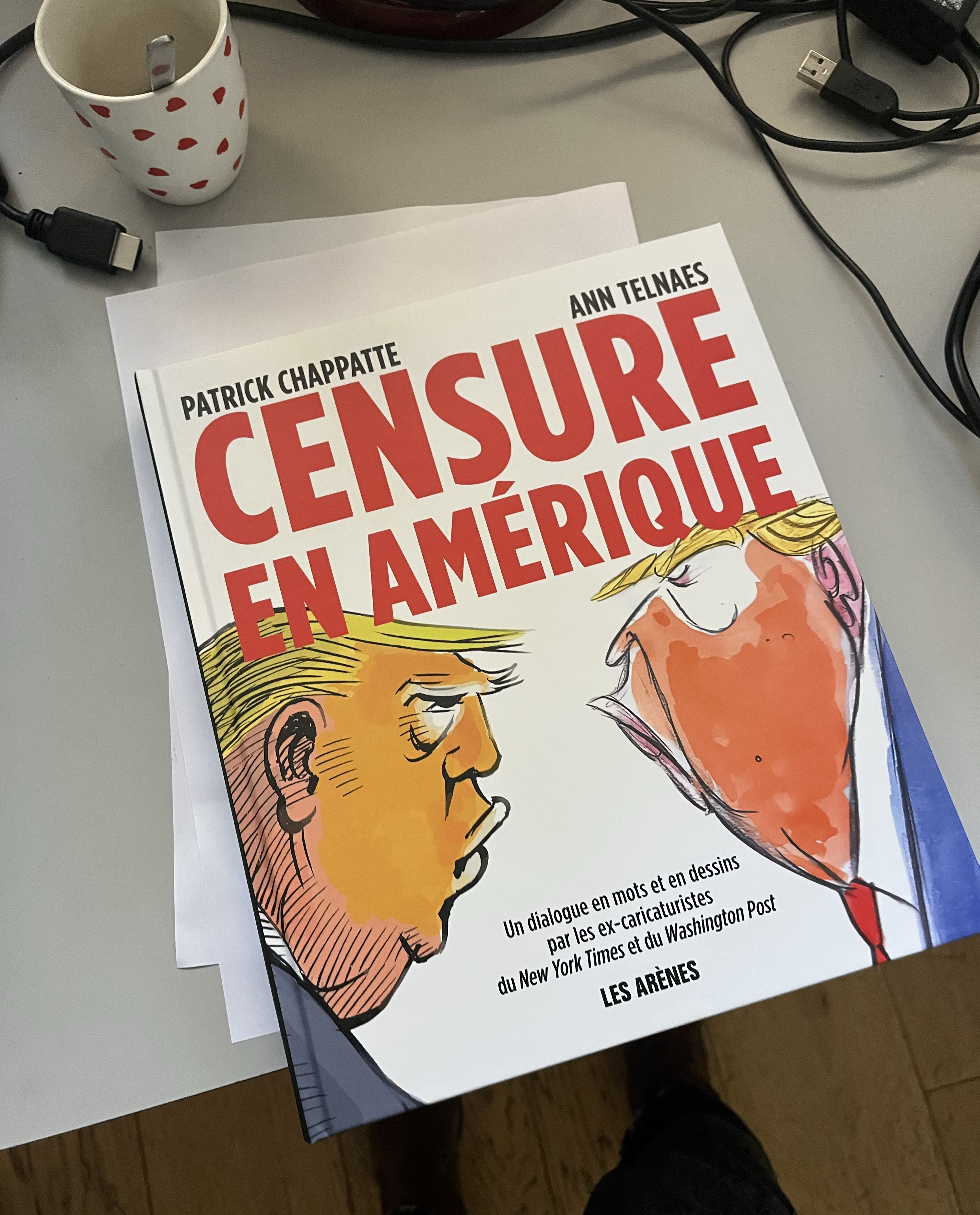 Political cartoon by Ann Telnaes, “A new book!”, 2025-10-08.